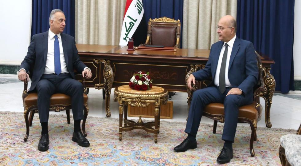 تاکید رئیس جمهور و نخست وزیر عراق بر یافتن نقشه‌راهی برای برون‌رفت از بحران